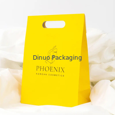 Emballage de vêtements Manche à découpe à découpe magasinage Sac en papier kraft sac cadeau jaune personnalisé