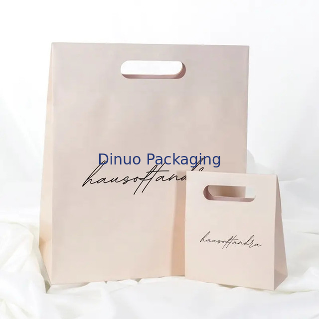 Emballage de vêtements Manche à découpe à découpe magasinage Sac en papier kraft sac cadeau jaune personnalisé