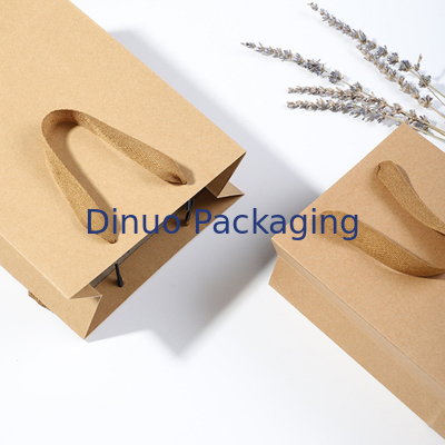 Le sac supérieur biodégradable réutilisable de poignée a adapté le sac aux besoins du client d'emballage de cadeau de papier d'emballage