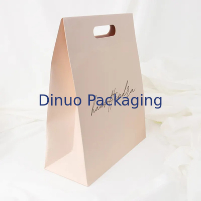 Emballage de vêtements Manche à découpe à découpe magasinage Sac en papier kraft sac cadeau jaune personnalisé